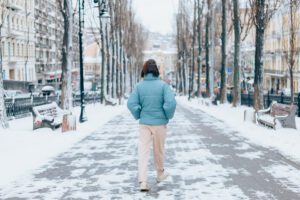 Icy sidewalk needs salt and liquid deicers in winter